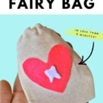 hand holding small drawstring tooth fairy bag