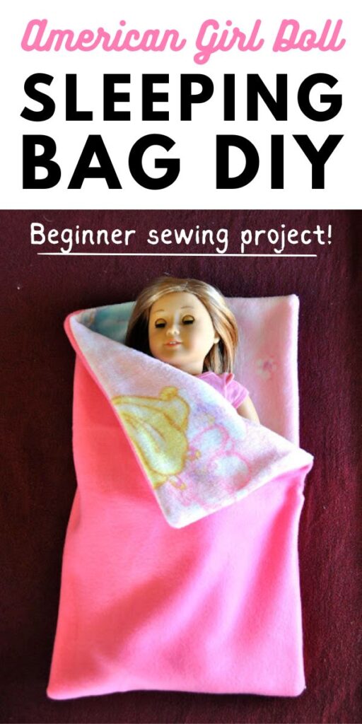 American girl doll inside pink fabric sleeping bag