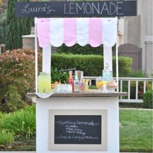 lemonade stand with pink and white striped awning