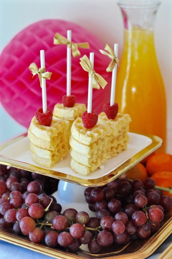 Waffles and fruit at a brunch party