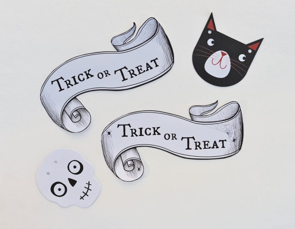 halloween banners and a cat and skeleton pictures