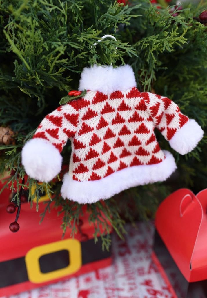 Sweater ornament on Christmas tree for One Warm Coat and Coca-Cola