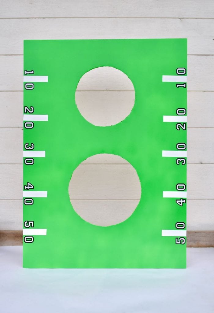 DIY Football Toss Game for Kids. So easy and fun for kids to play during the big game!