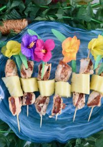 Moana party food idea. Make chicken skewers with Chick-Fil-A grilled chicken nuggets and fresh pineapple.