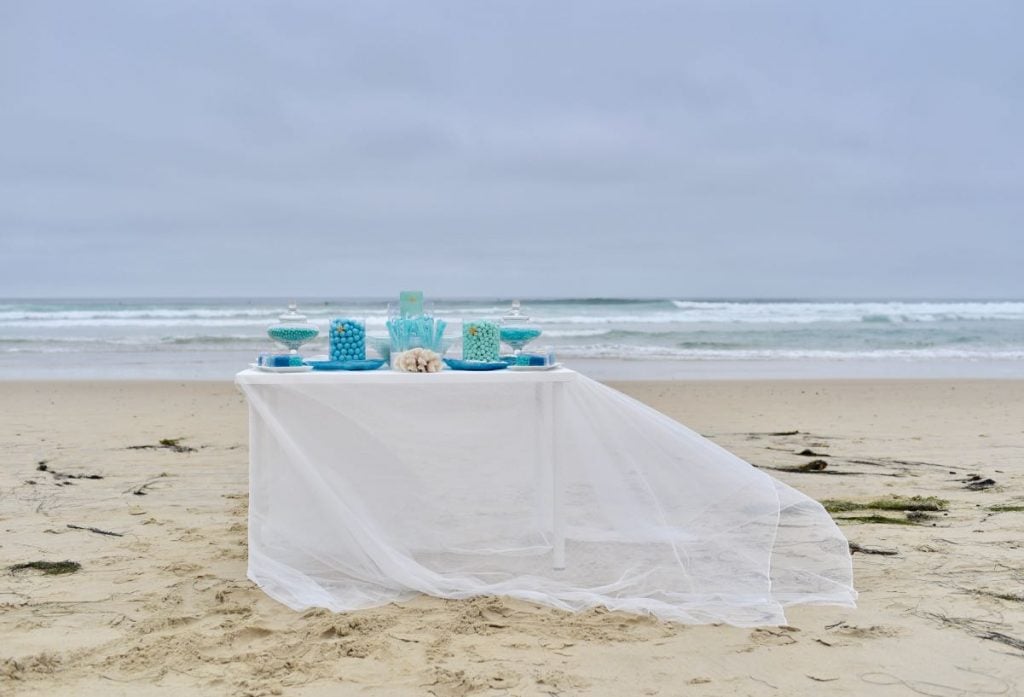 Blue and turquoise candy buffet at beach wedding