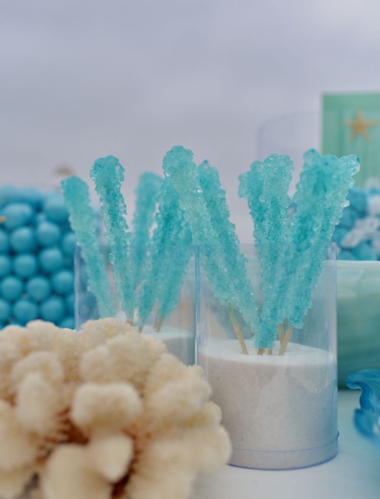 Blue rock candy at beach wedding candy buffet