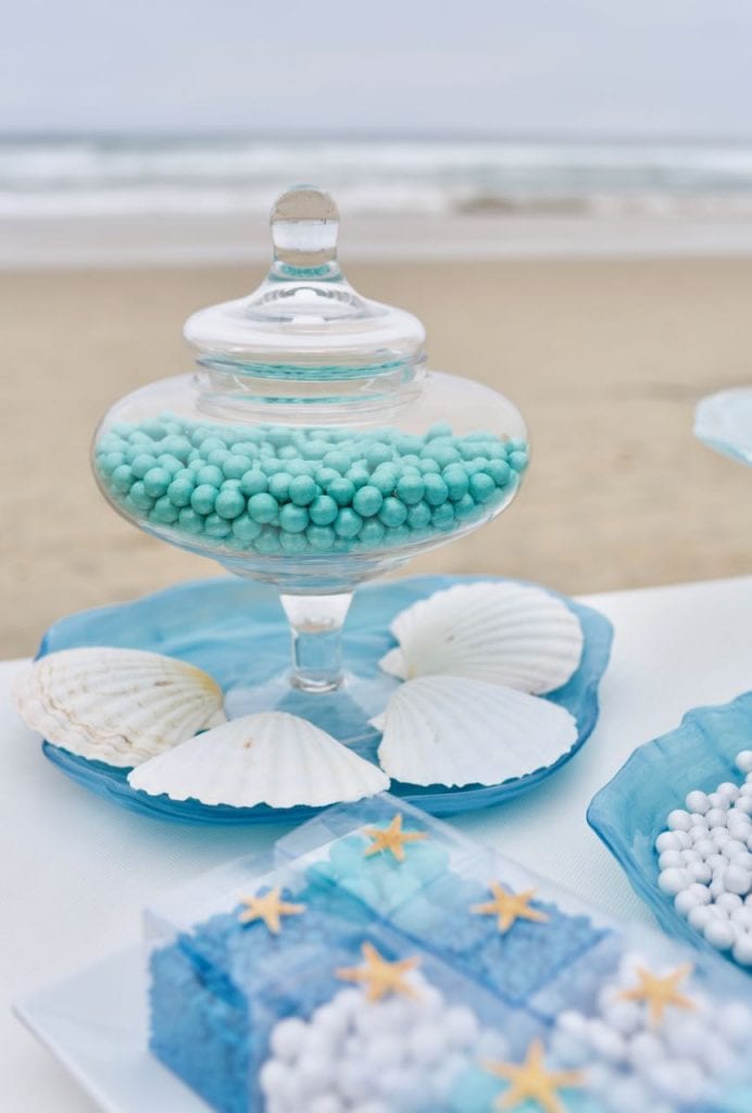 Nautical wedding blue candy buffet at beach