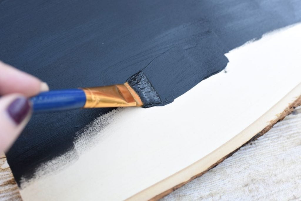 Paint the wood sign with chalkboard paint