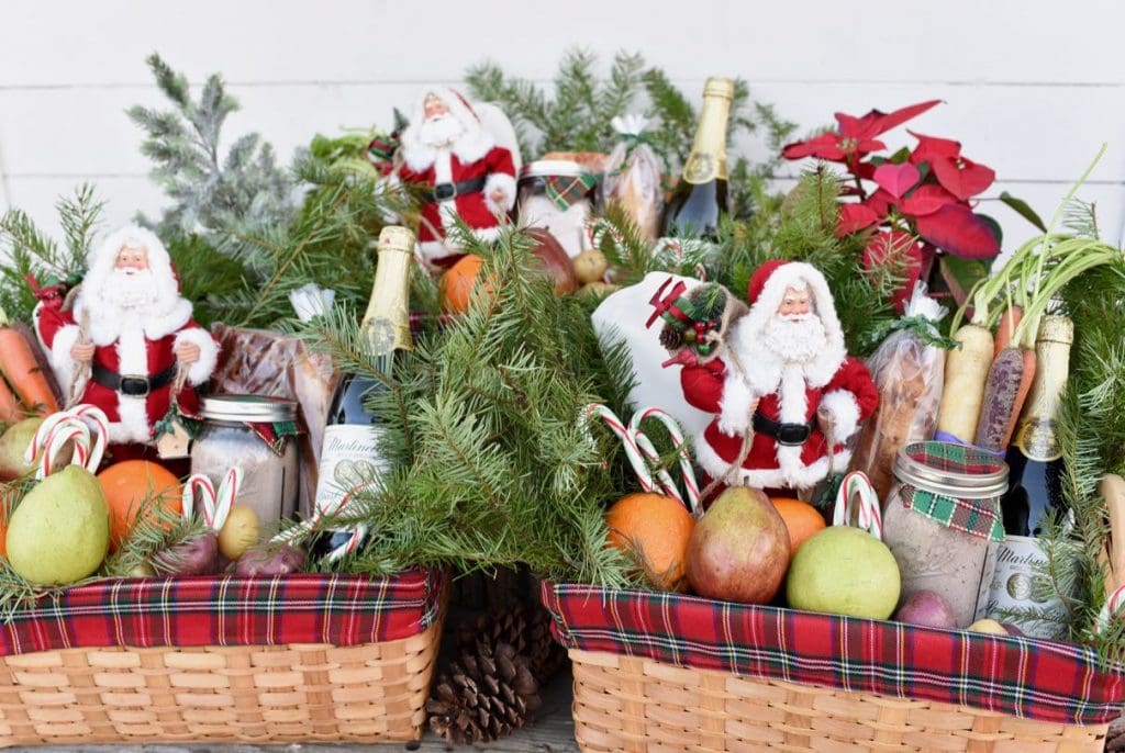three Christmas gift baskets for families