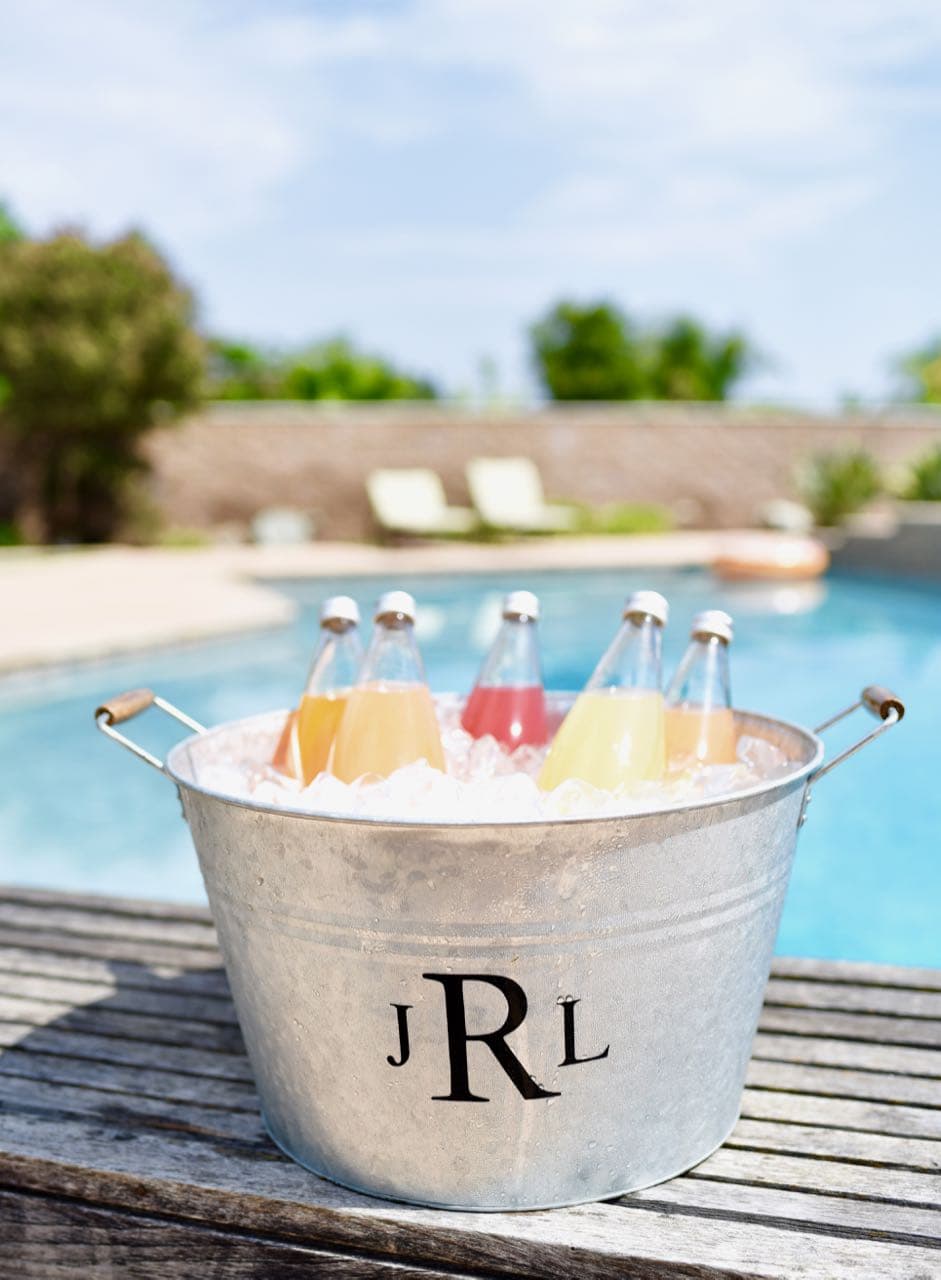 DIY monogram ice bucket with vinyl and Cricut machine. Personalize your