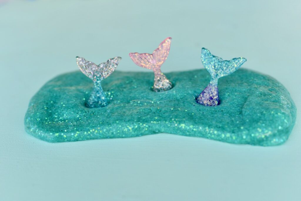 Glitter mermaid slime with three mermaid tails