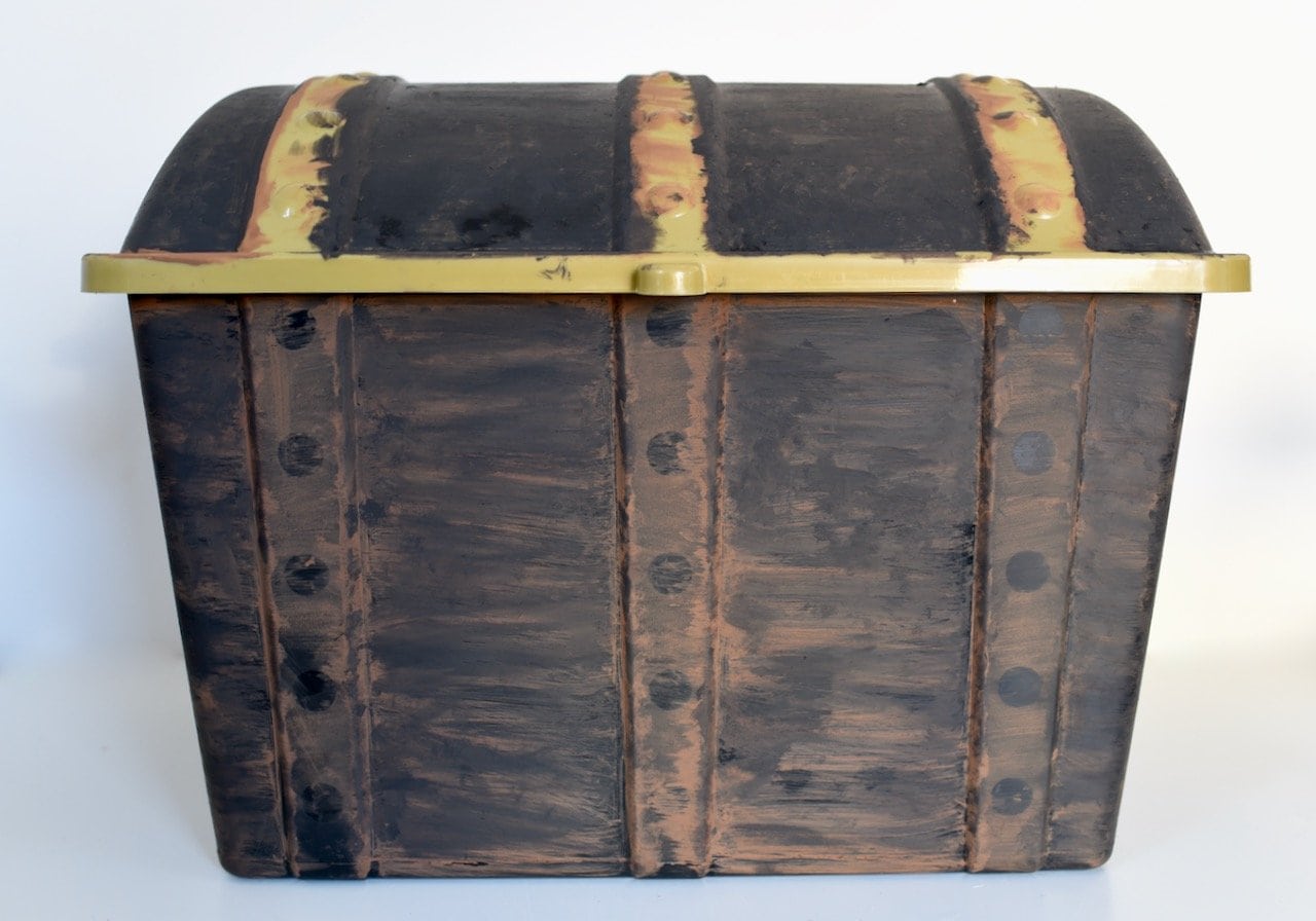 Treasure chest made of gold. Antique chest made of wood and metal