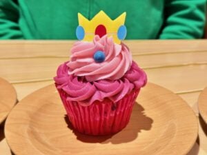 pink princess peach cupcake with pink frosting