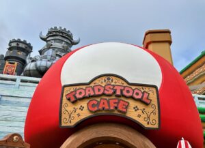 mushroom shaped building with Toadstool Cafe sign