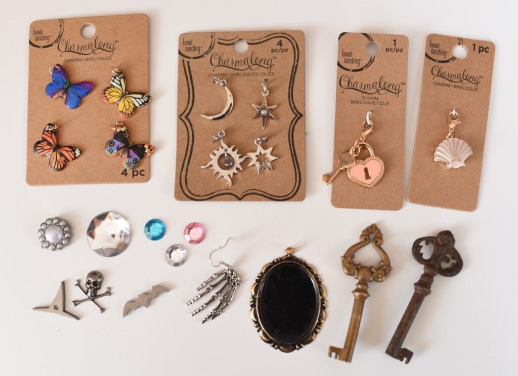 Colorful metal charms and rhinestones and keys