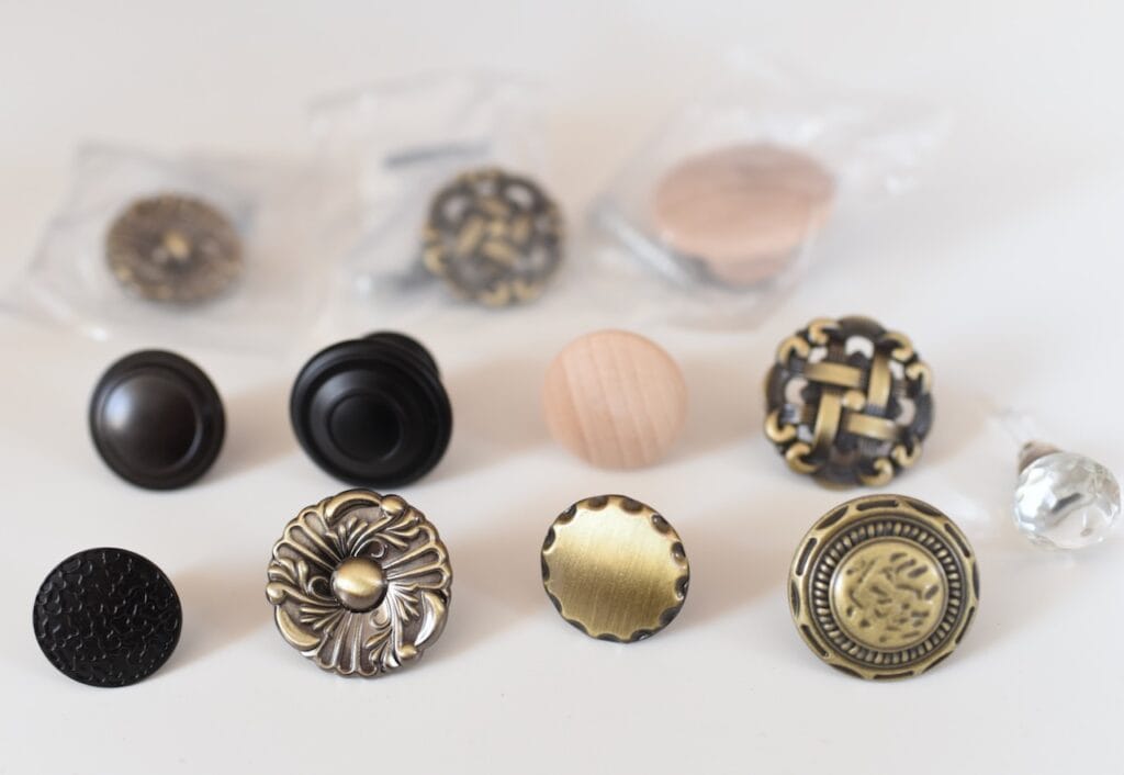 Gold and black knobs and drawer pulls