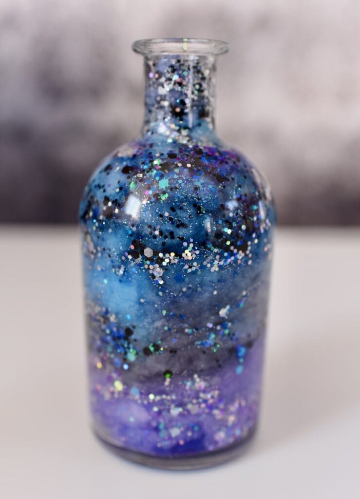 Blue and purple galaxy jar with silver glitter