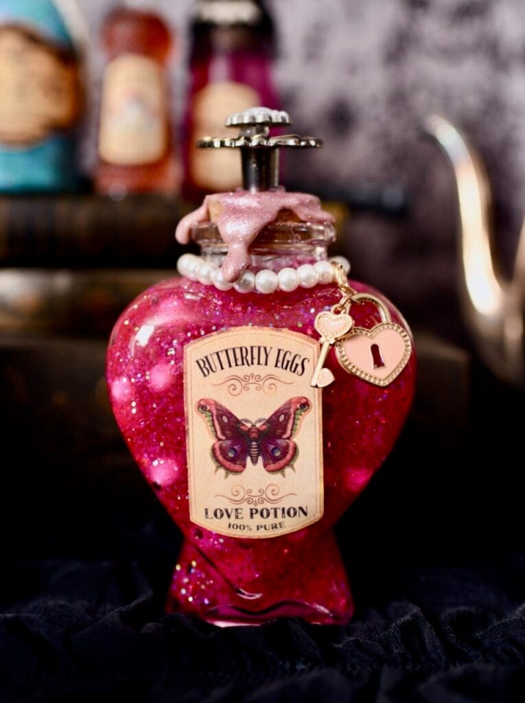 Love potion bottle filled with pink glittery gel