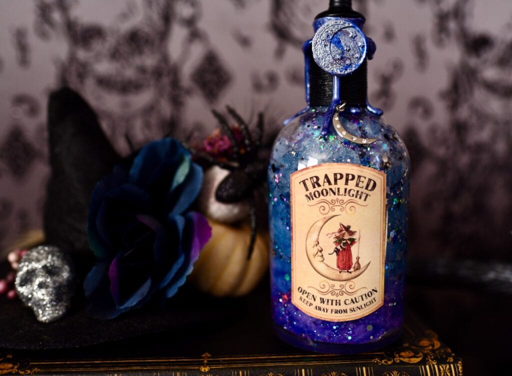 Trapped moonlight witches potion bottle with purple and blue inside glass bottle