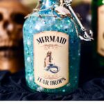 blue mermaid potion bottle with mermaid label