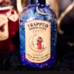 dark blue potion bottle with silver moon