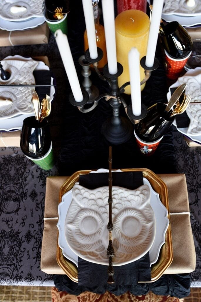 white owl plate with magic wand on top