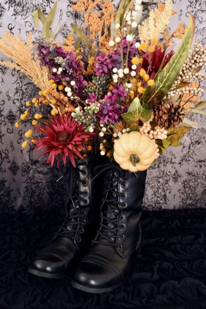 black witch boots flower arrangement with fall flowers