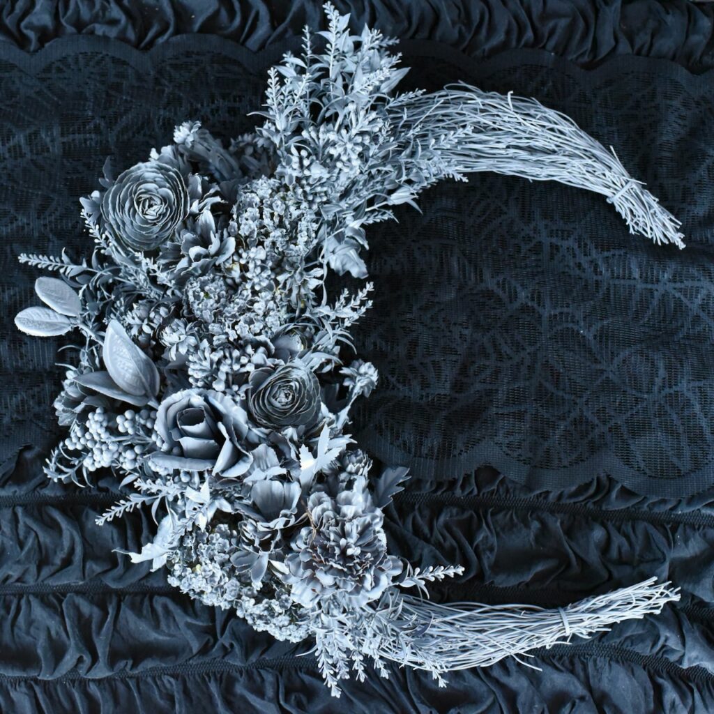 gray moon wreath with gray flowers