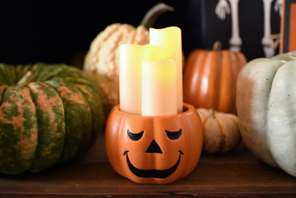 candles inside orange jack o lantern